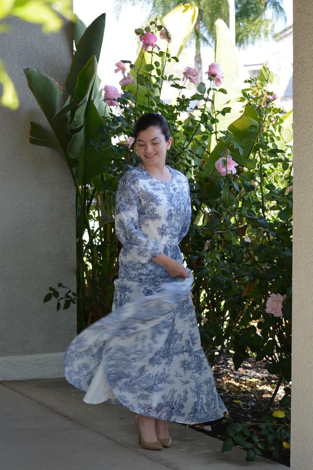 Marbella Navy Toile Dress by The Skirt Society featuring a classic navy toile pattern, fitted bodice, and flowing skirt.