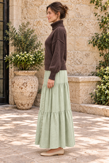 Timing deep brown heathered turtleneck sweater worn with sage maxi skirt, left view