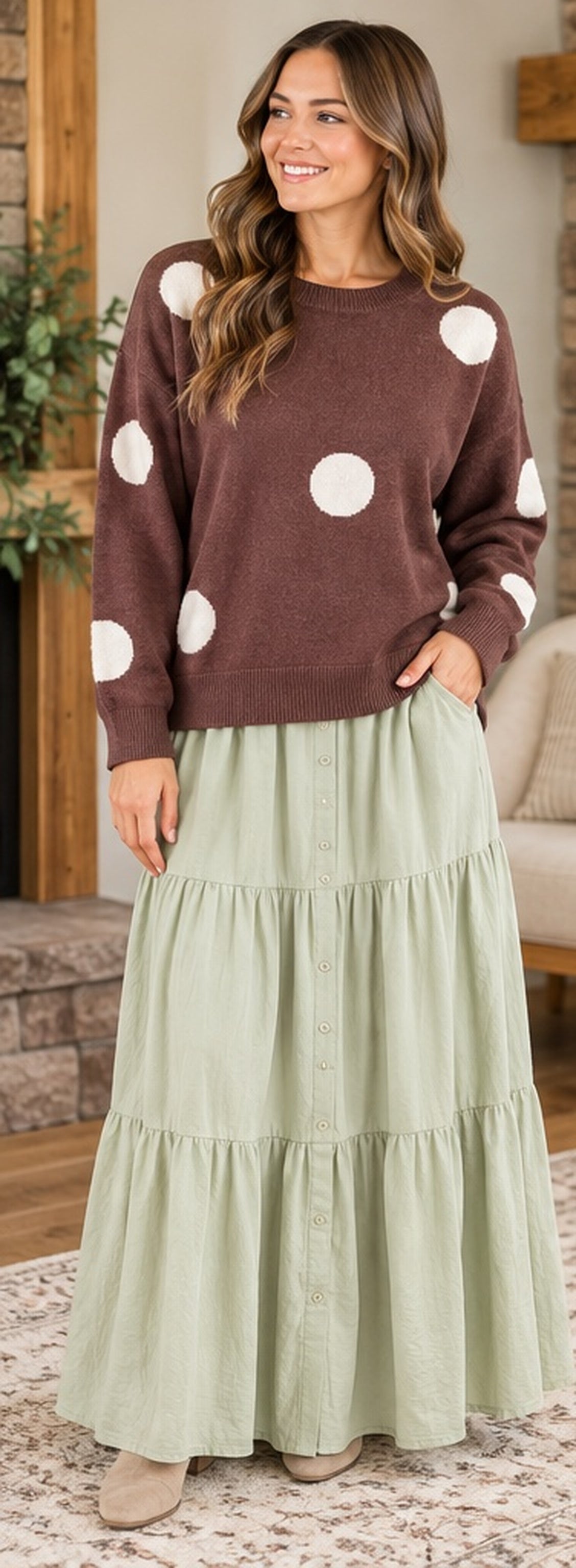 Front lifestyle view chocolate ivory polka dot sweater with sage maxi skirt