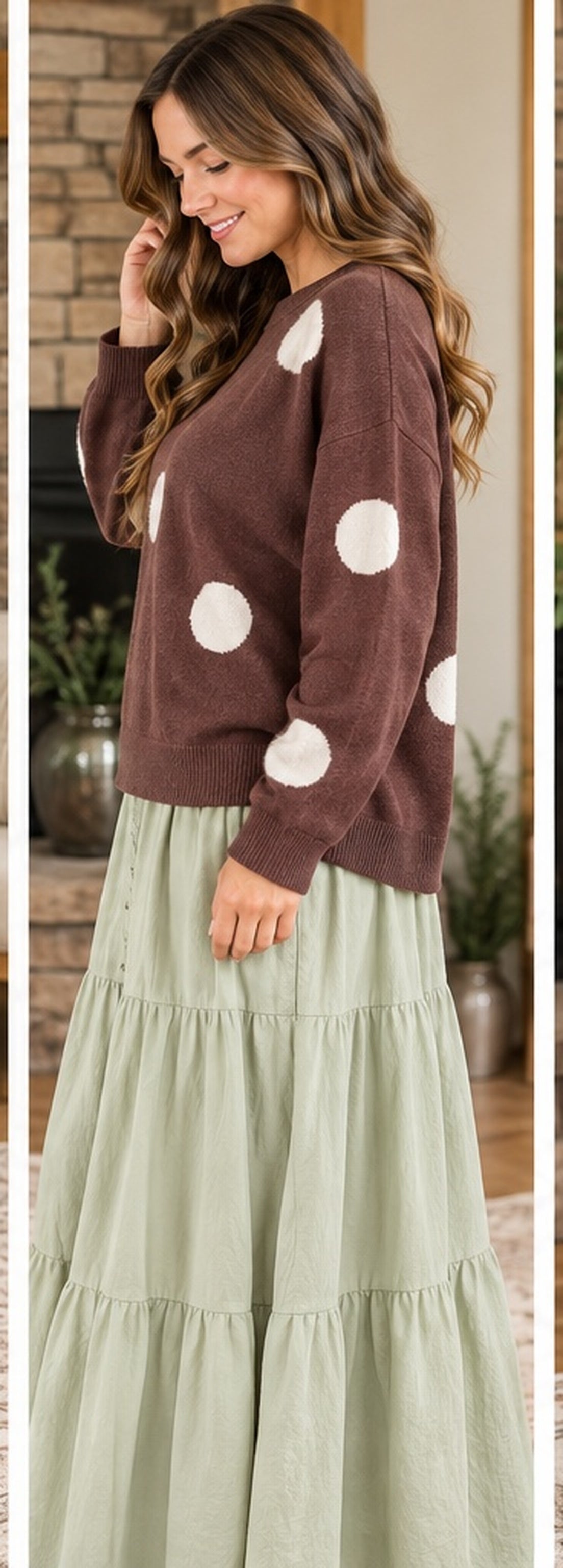 Side lifestyle view chocolate polka dot sweater and maxi skirt