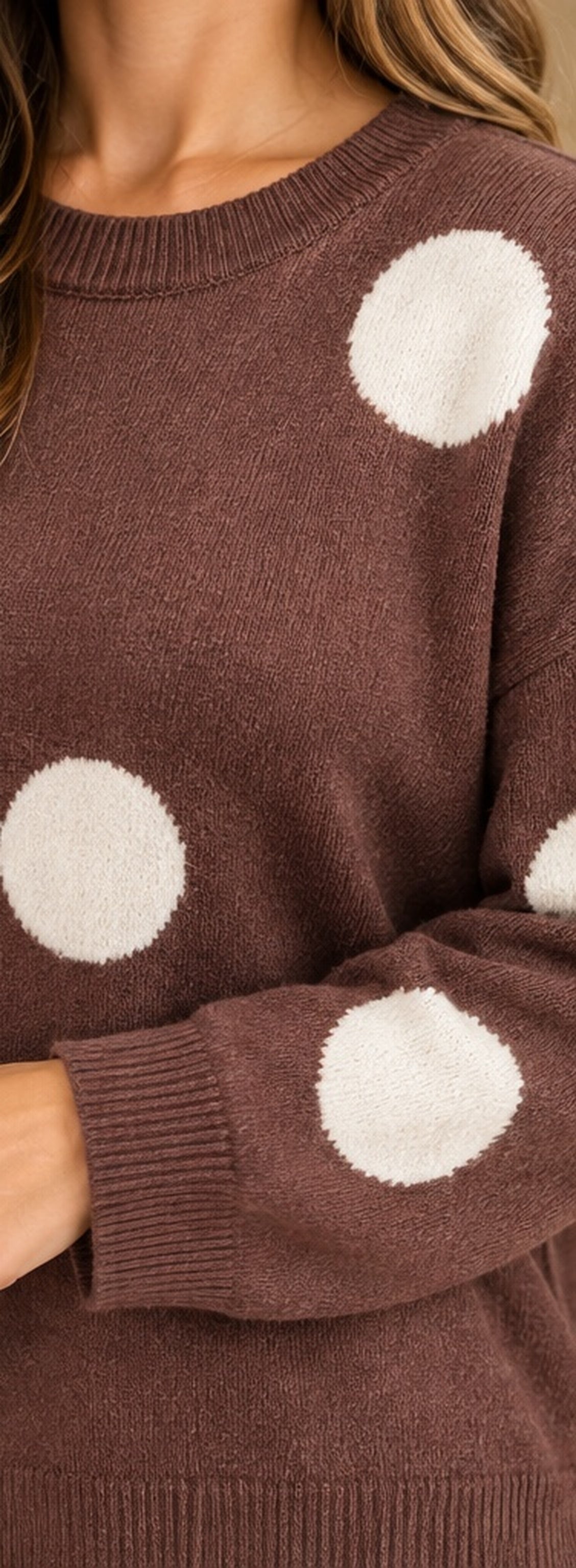 Close up ivory dot and knit texture Timing sweater