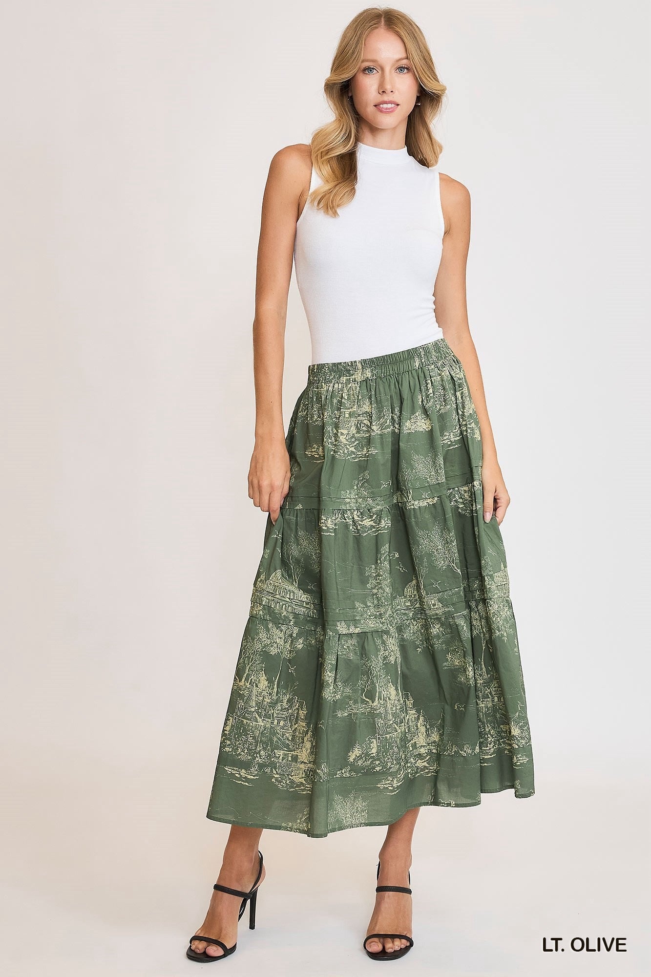 Olive green toile pintuck maxi skirt by Umgee featuring a flowy design and seasonless style, perfect for casual or dressy occasions.