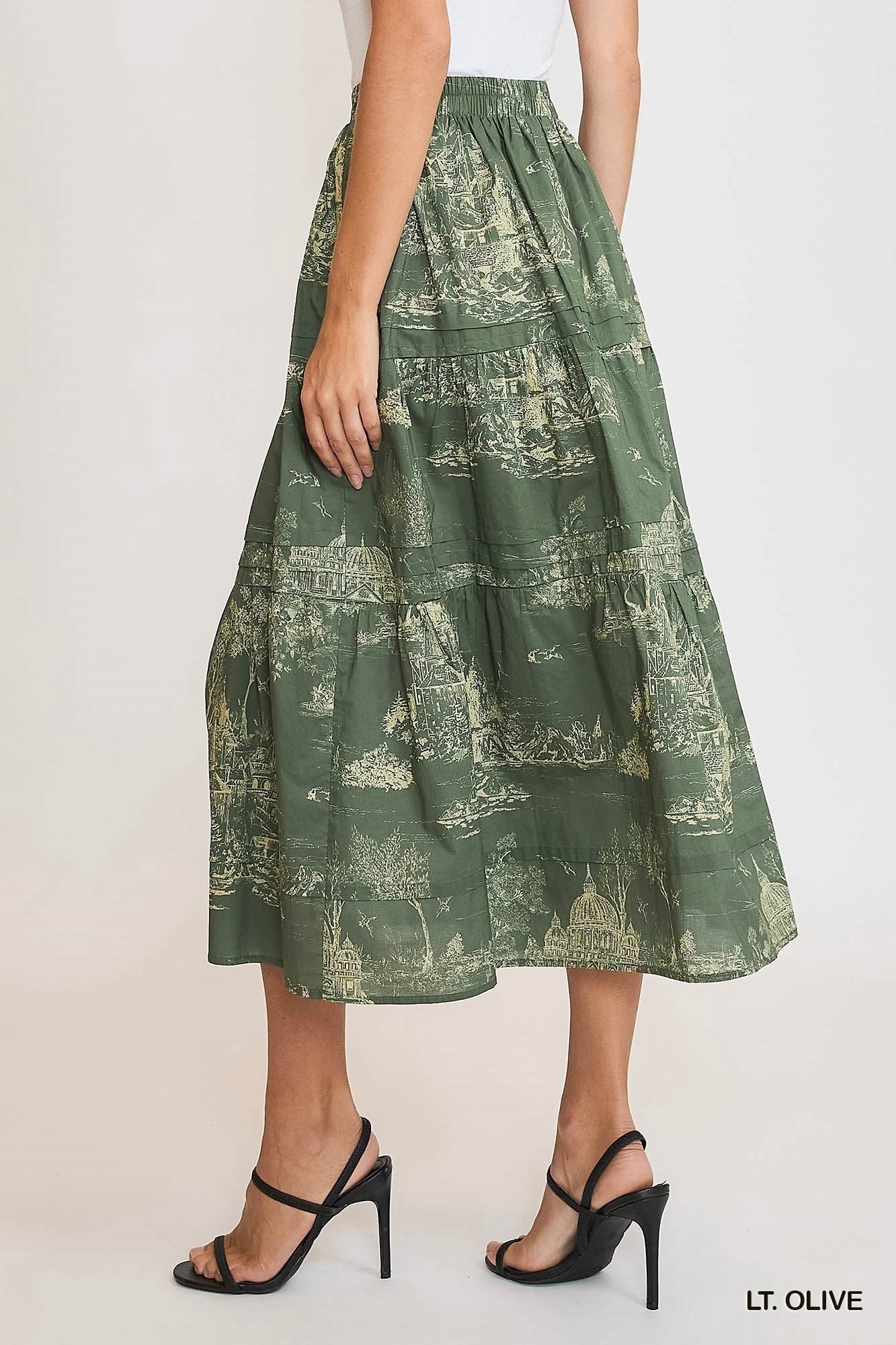 Olive green toile pintuck maxi skirt by Umgee, featuring a flowy silhouette and detailed pintuck design for a stylish look.