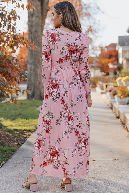 Pink faux wrap empire maxi dress by ModestAndDevoted, featuring a flowing silhouette and elegant neckline.