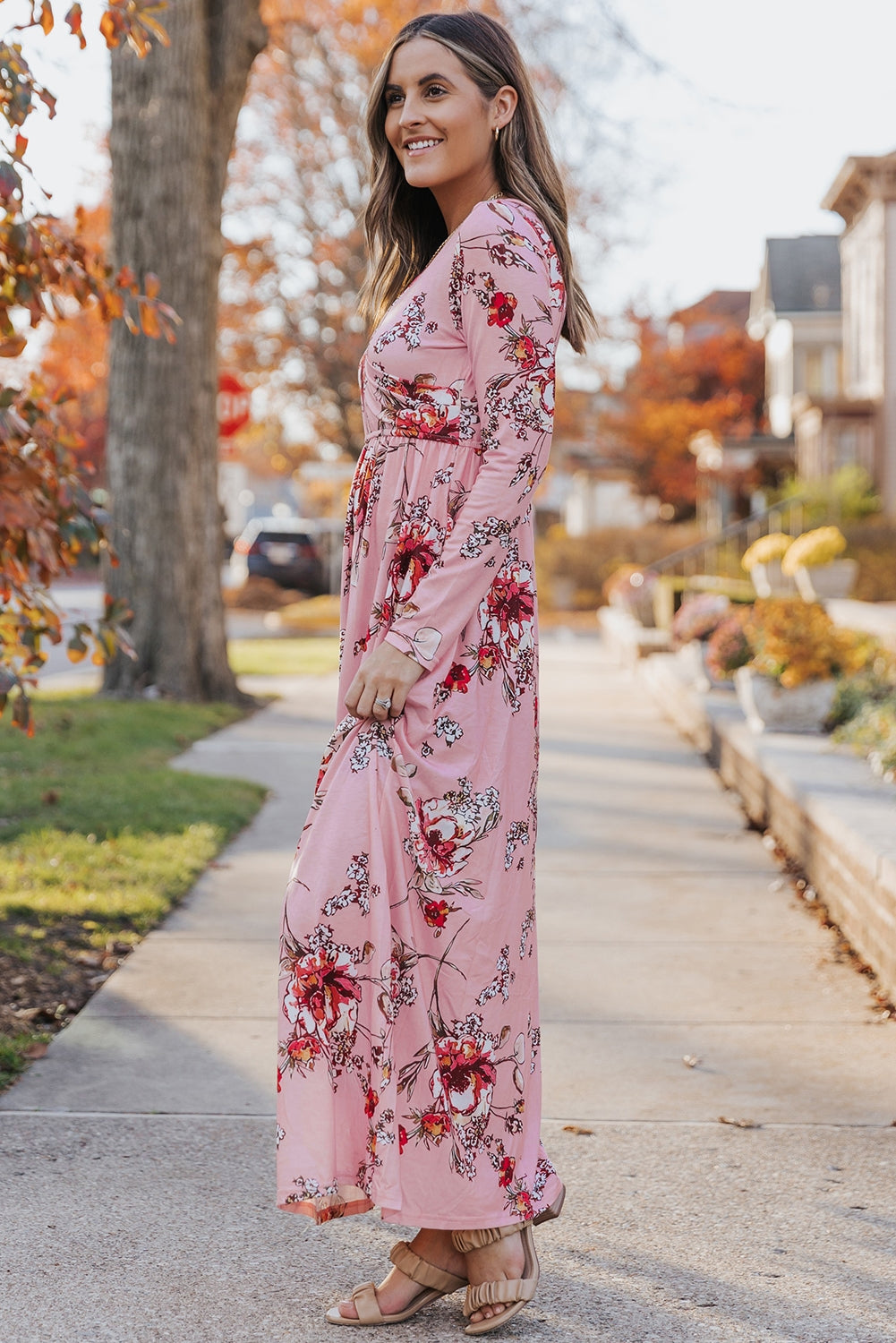 Pink faux wrap empire maxi dress featuring a flowing design and elegant silhouette, perfect for casual or formal occasions.