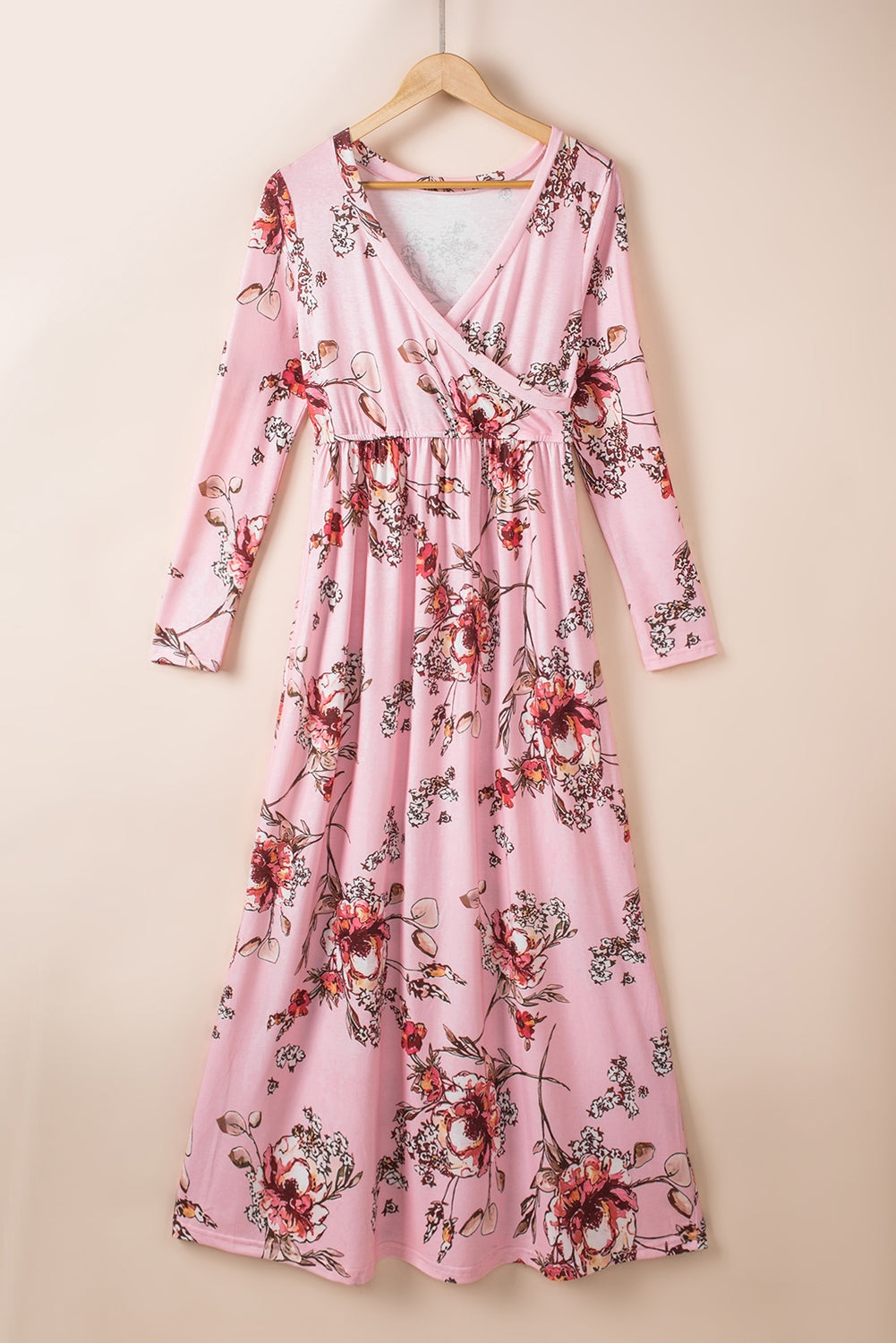 Pink faux wrap empire maxi dress featuring a flowy design and elegant fit, perfect for casual or dressy occasions.