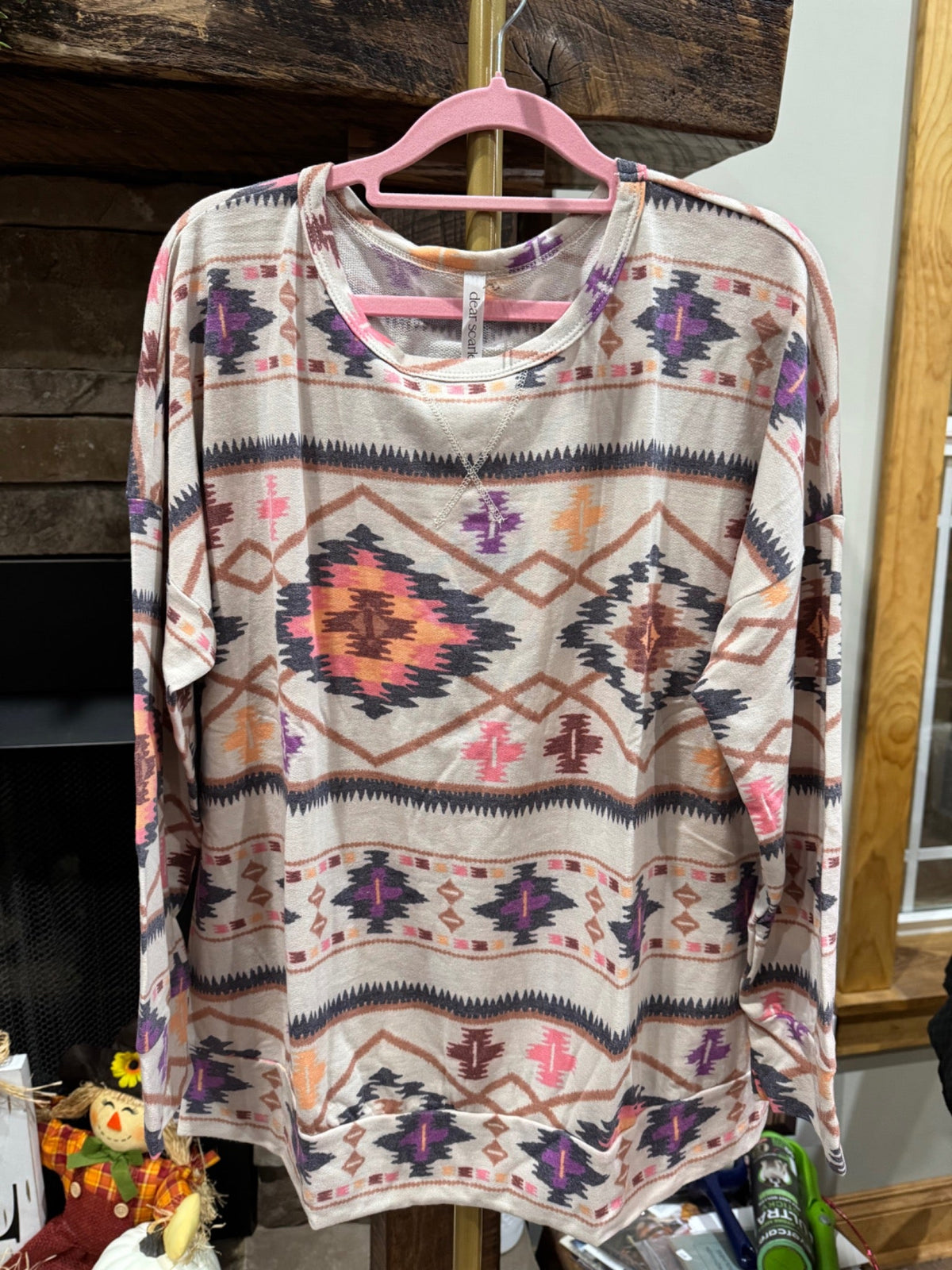 Front view of Dear Scarlett Weekend Wanderer Aztec print French terry top