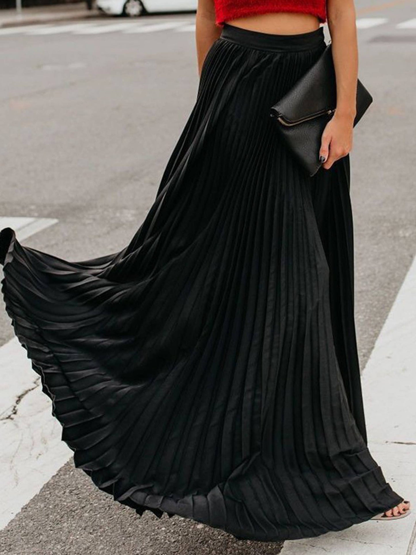Green solid color long pleated skirt by Wholesalesir, dressy style, with a structured waistband and flowing design.