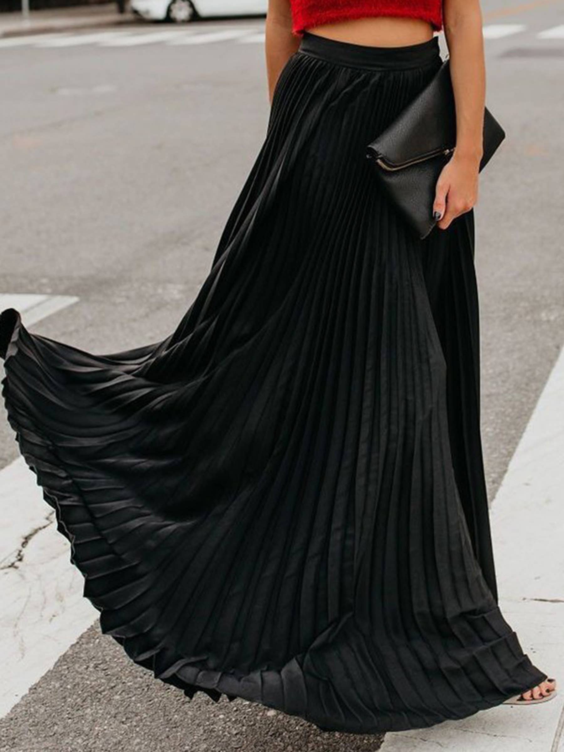 Green solid color long pleated skirt by Wholesalesir, dressy style, with a structured waistband and flowing design.
