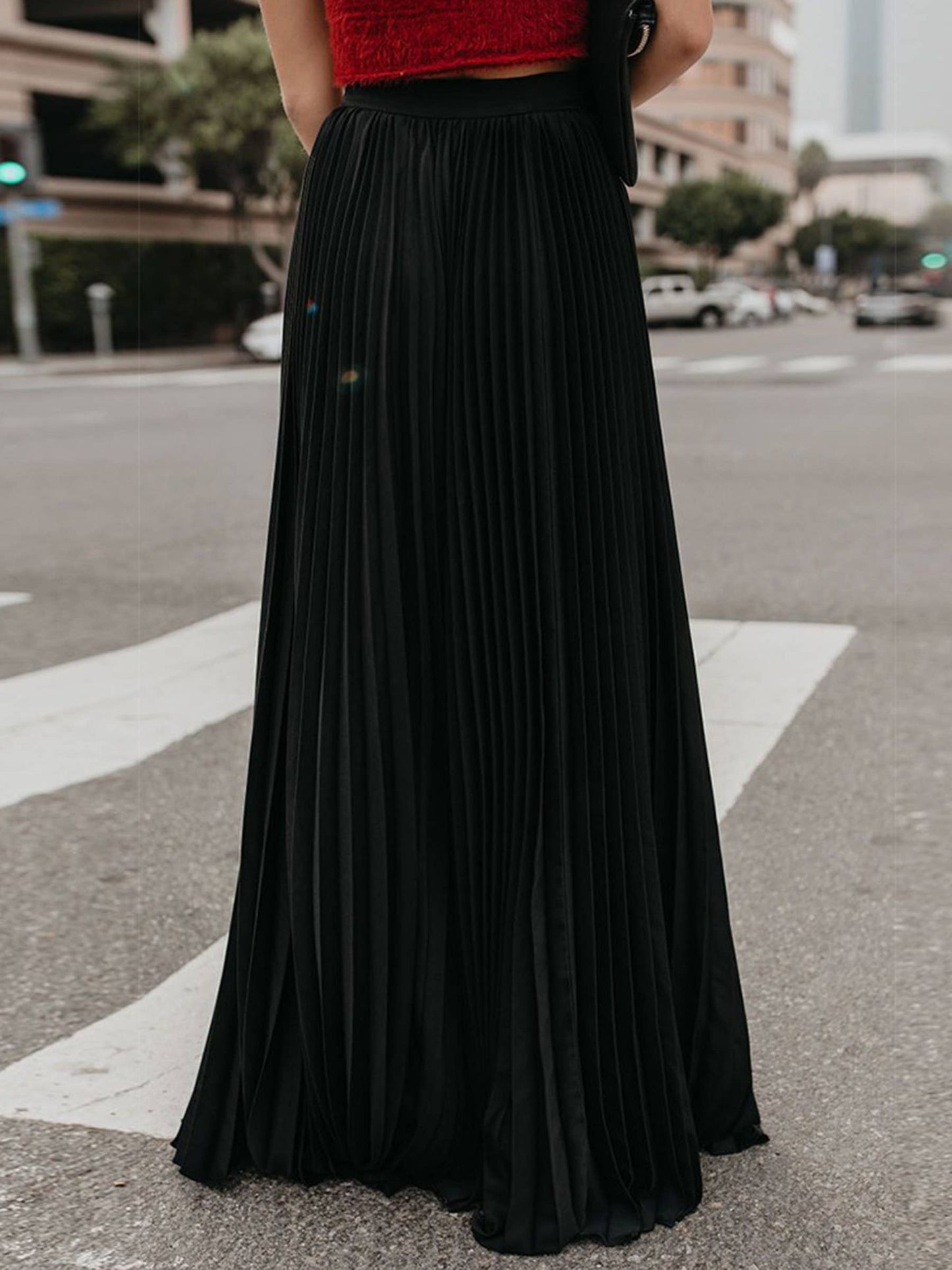 Green solid color long pleated dressy skirt by wholesalesir, featuring a stylish, elegant design and a comfortable fit.