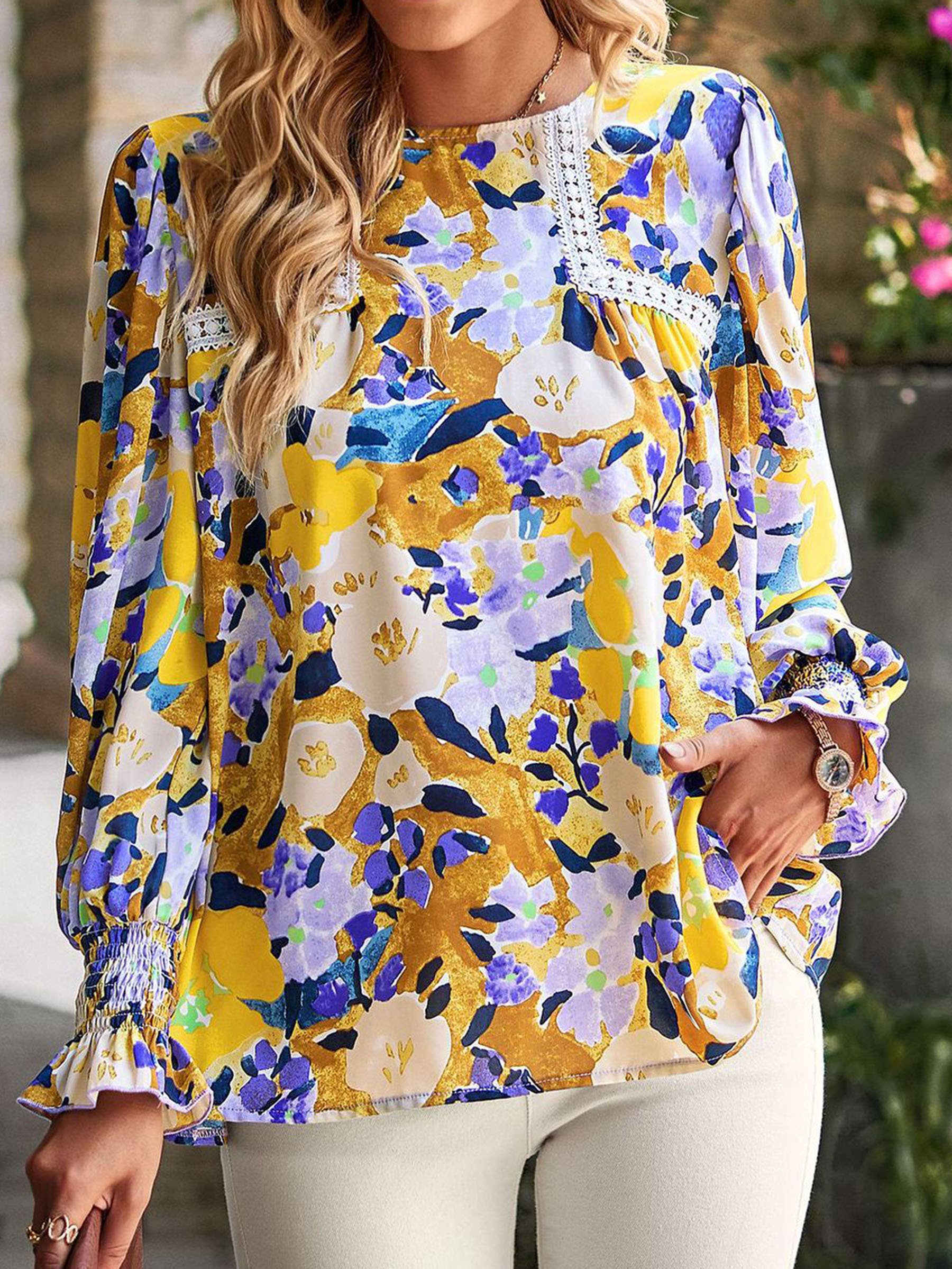 Women's floral print flounce long sleeve blouse by wholesalesir, colorful dressy top with feminine floral pattern and layered sleeve design.