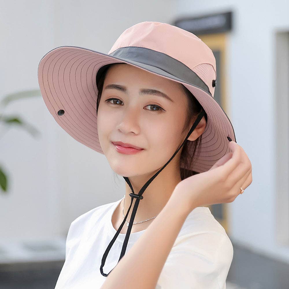 Pink women's UV protection hat with foldable wide brim and ponytail opening, stylish sun hat by wholesalesir.