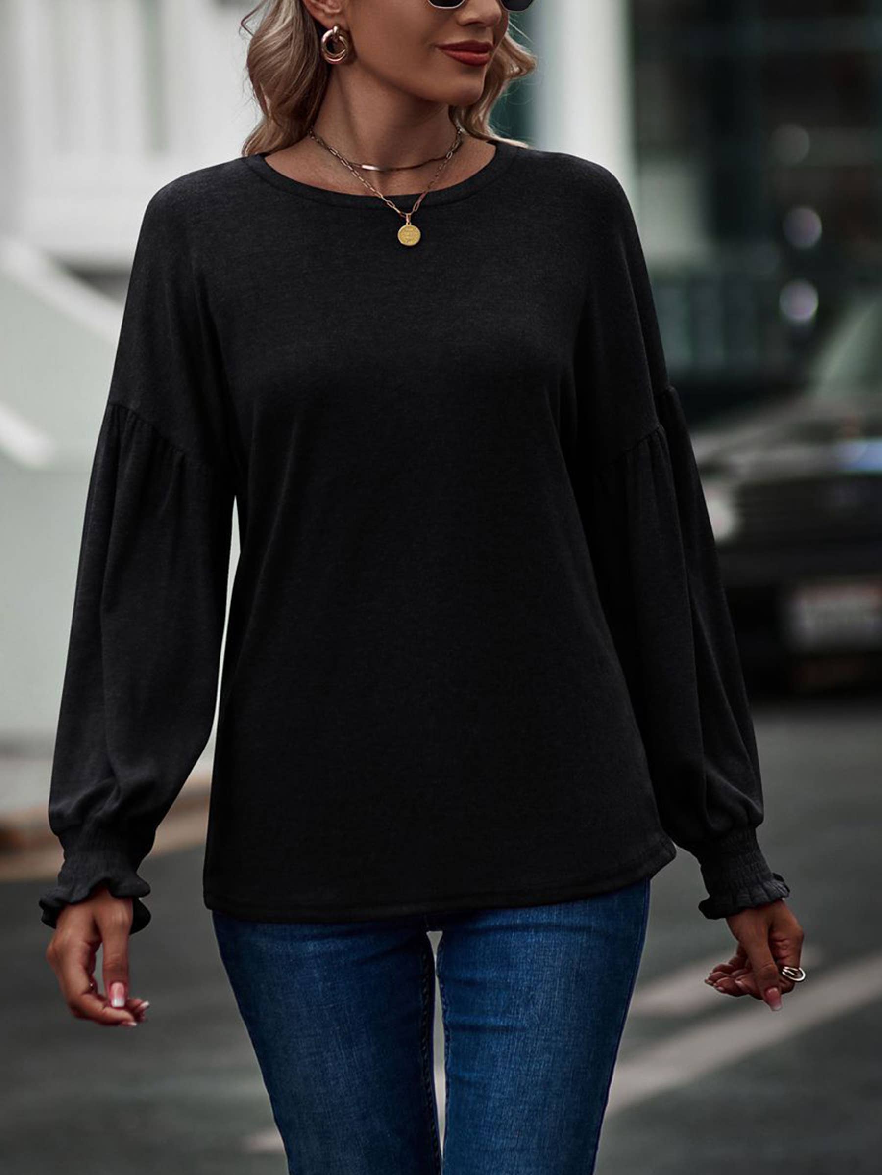 Beige women's long sleeve top with round neckline, pleated lantern sleeves, from wholesalesir.
