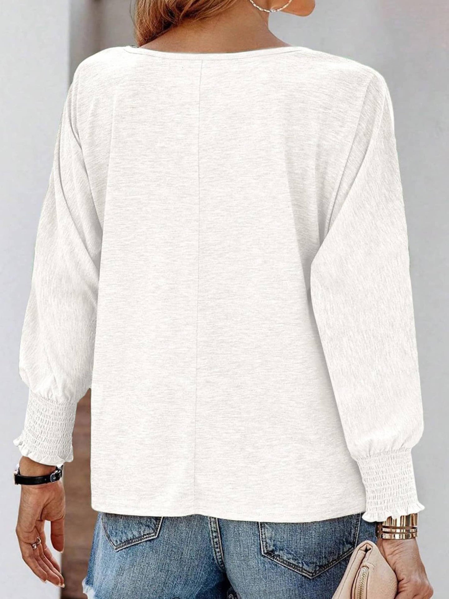 White long sleeve T-shirt for women by wholesalesir featuring a fashionable round neck and fitted design.
