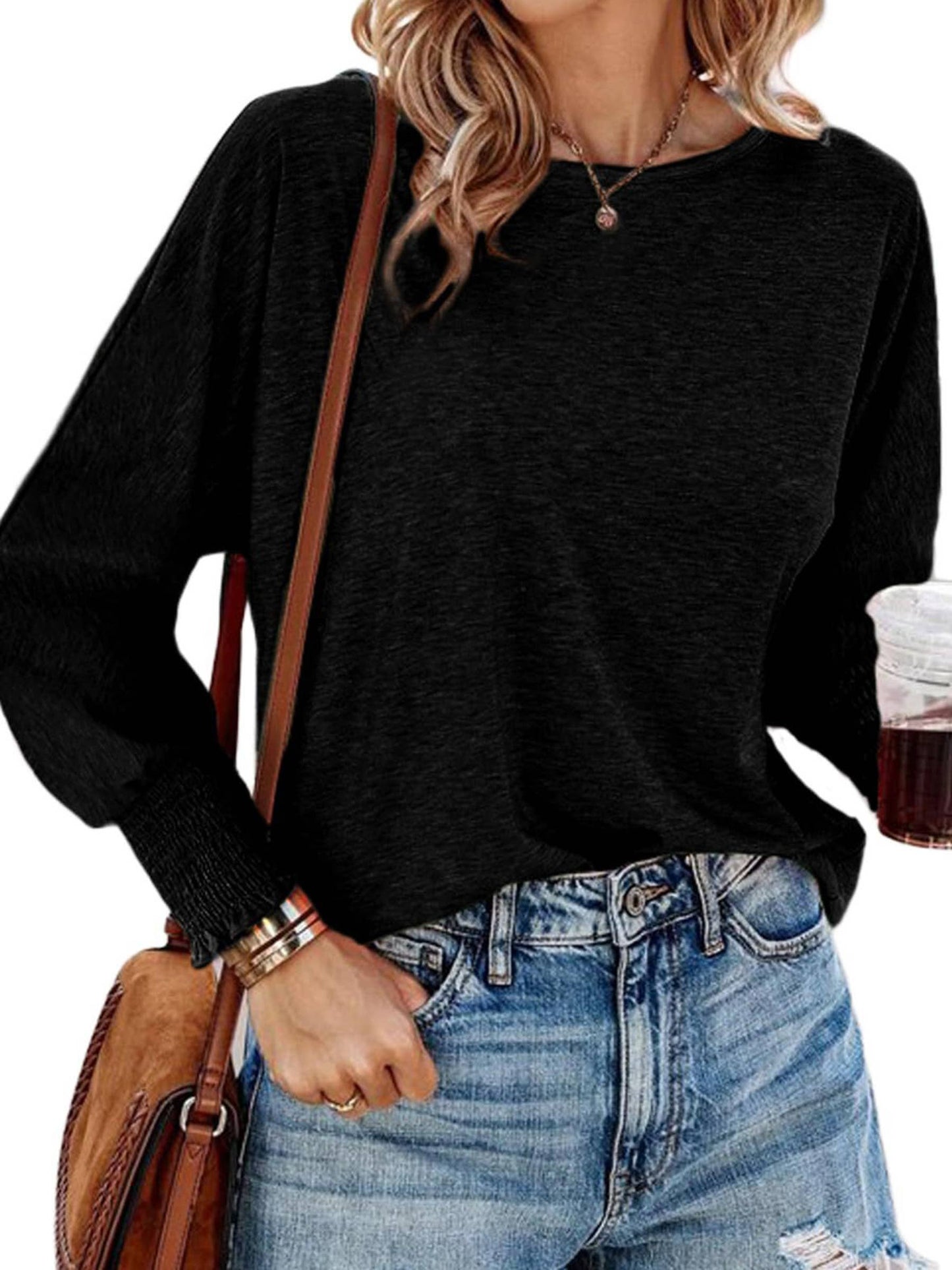 White long sleeve women's T-shirt with round neck from wholesalesir, casual fashion top for everyday wear.