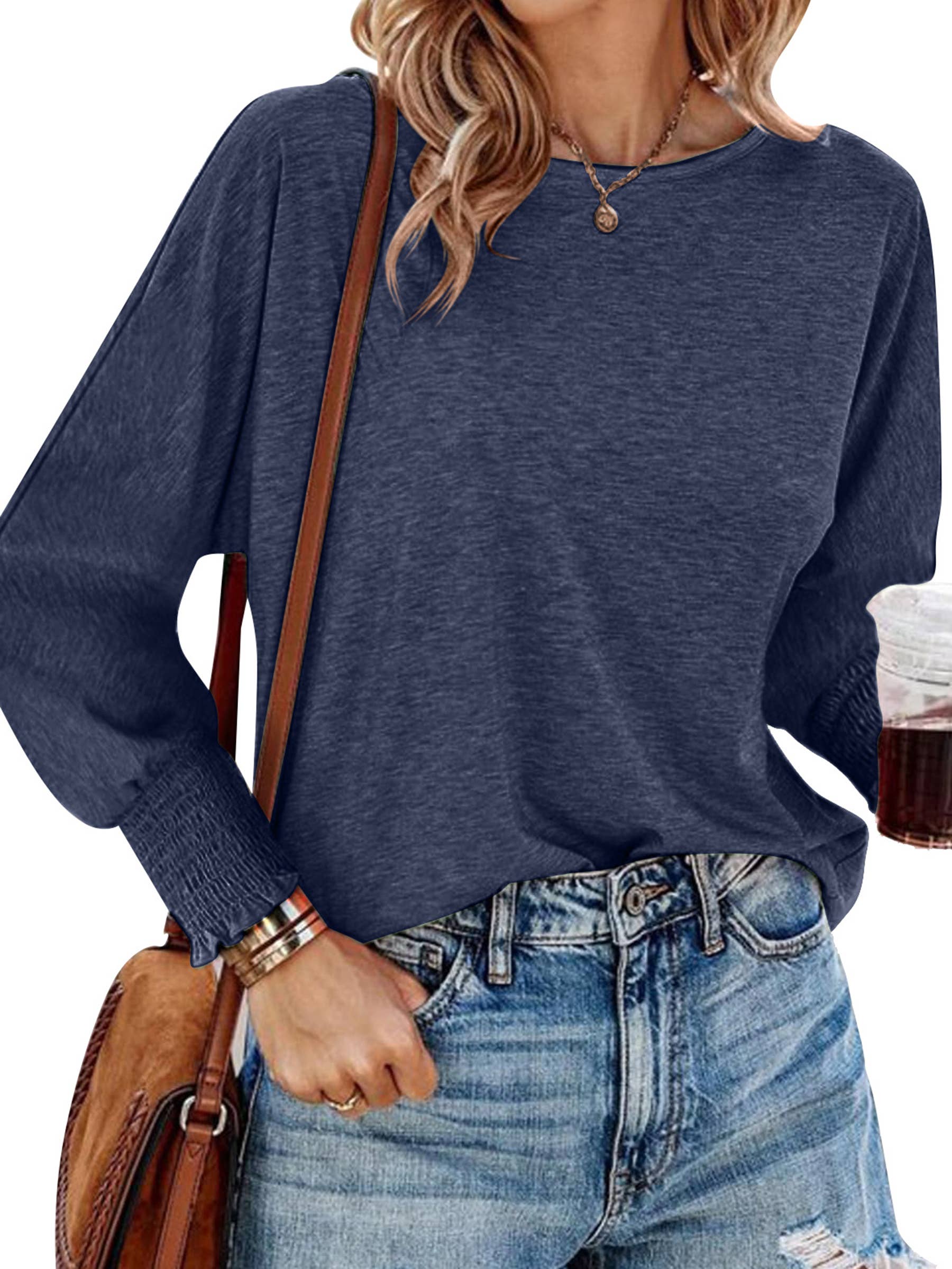 White long sleeve women's T-shirt with round neck, from wholesalesir, featuring a casual and comfortable fit.