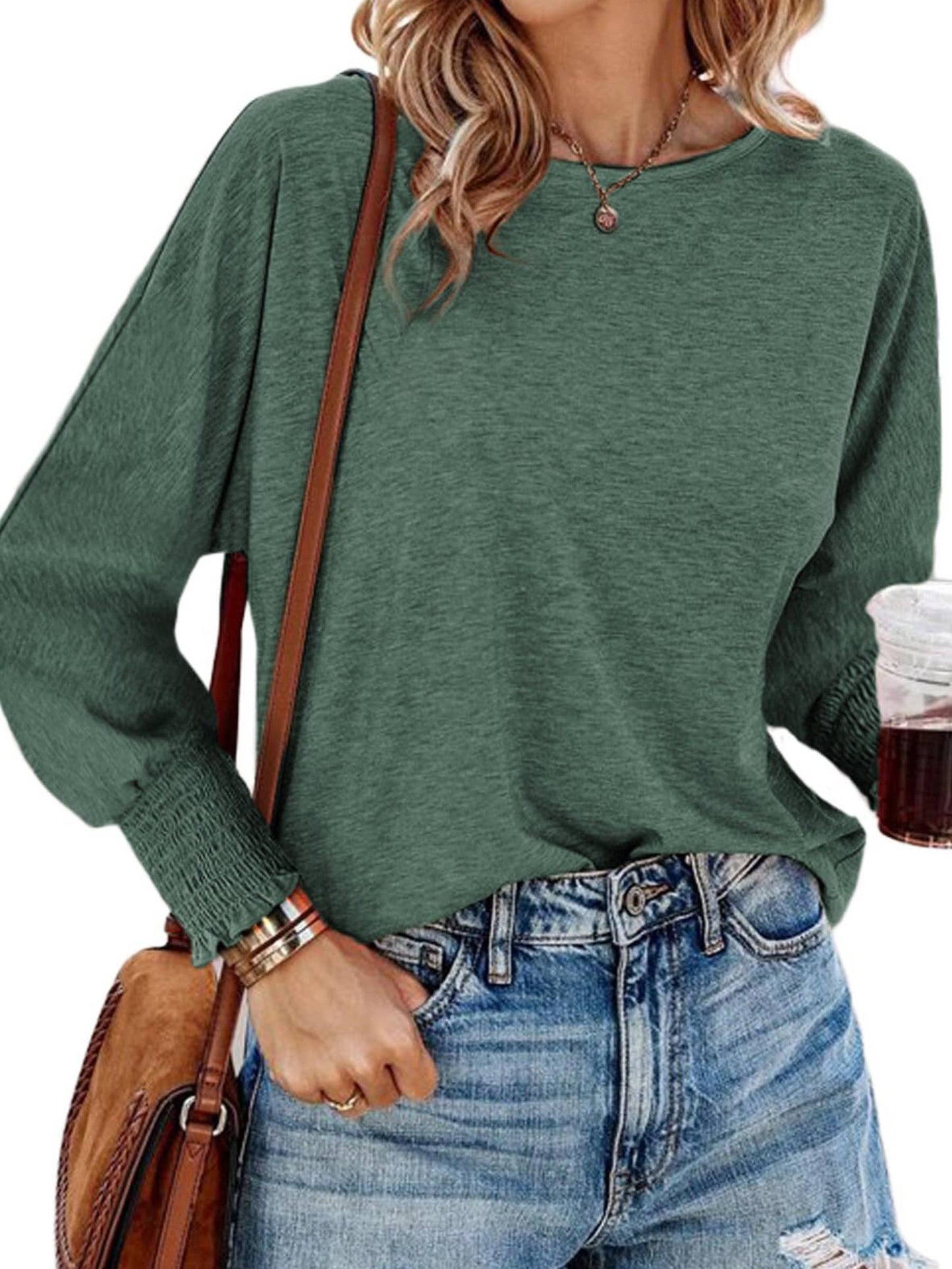 White long sleeve T-shirt for women with a round neck, casual fashion top by wholesalesir, displayed on a plain background.