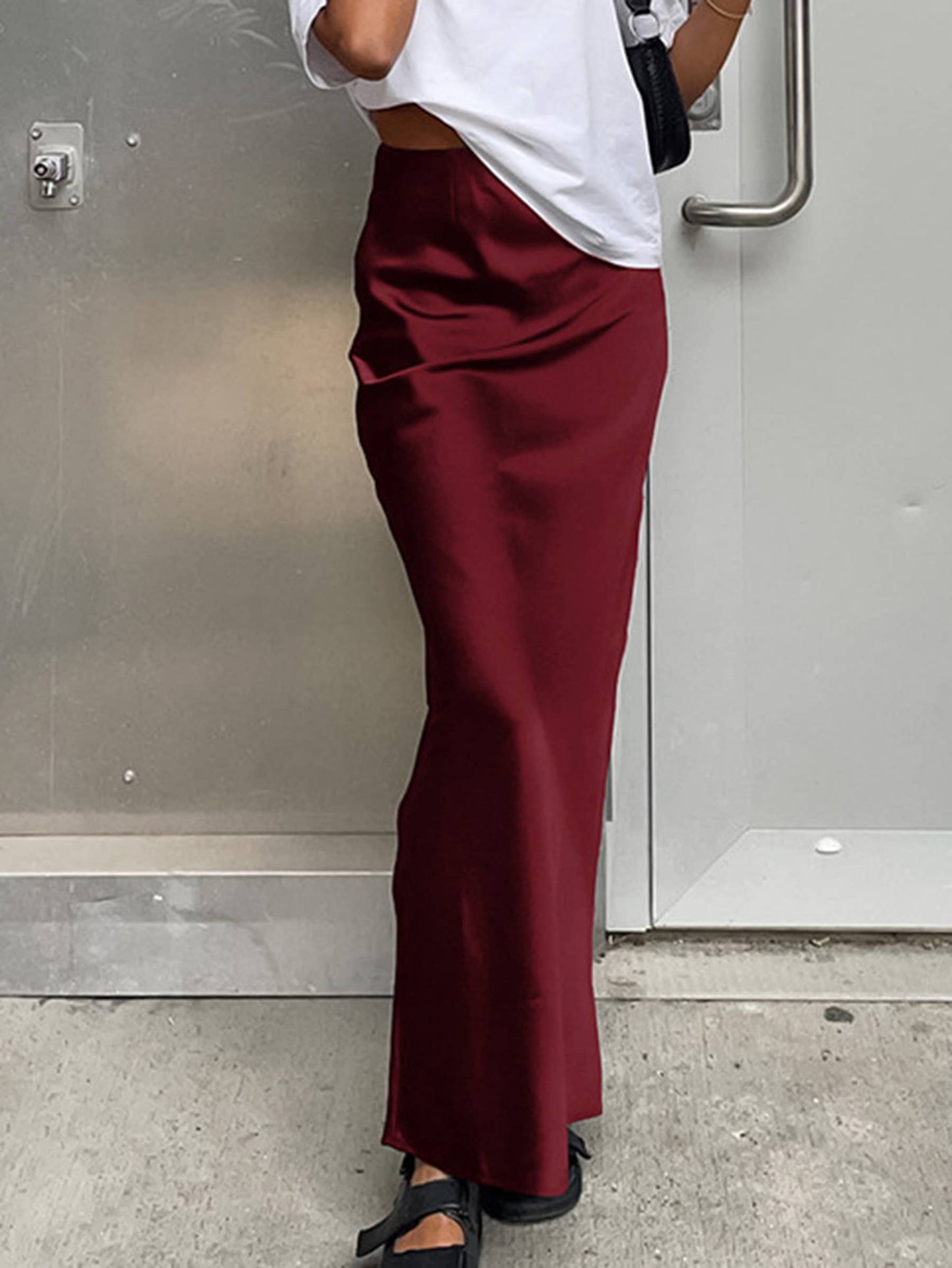 Black satin maxi length fishtail skirt for women, suitable for commuting, by wholesalesir.