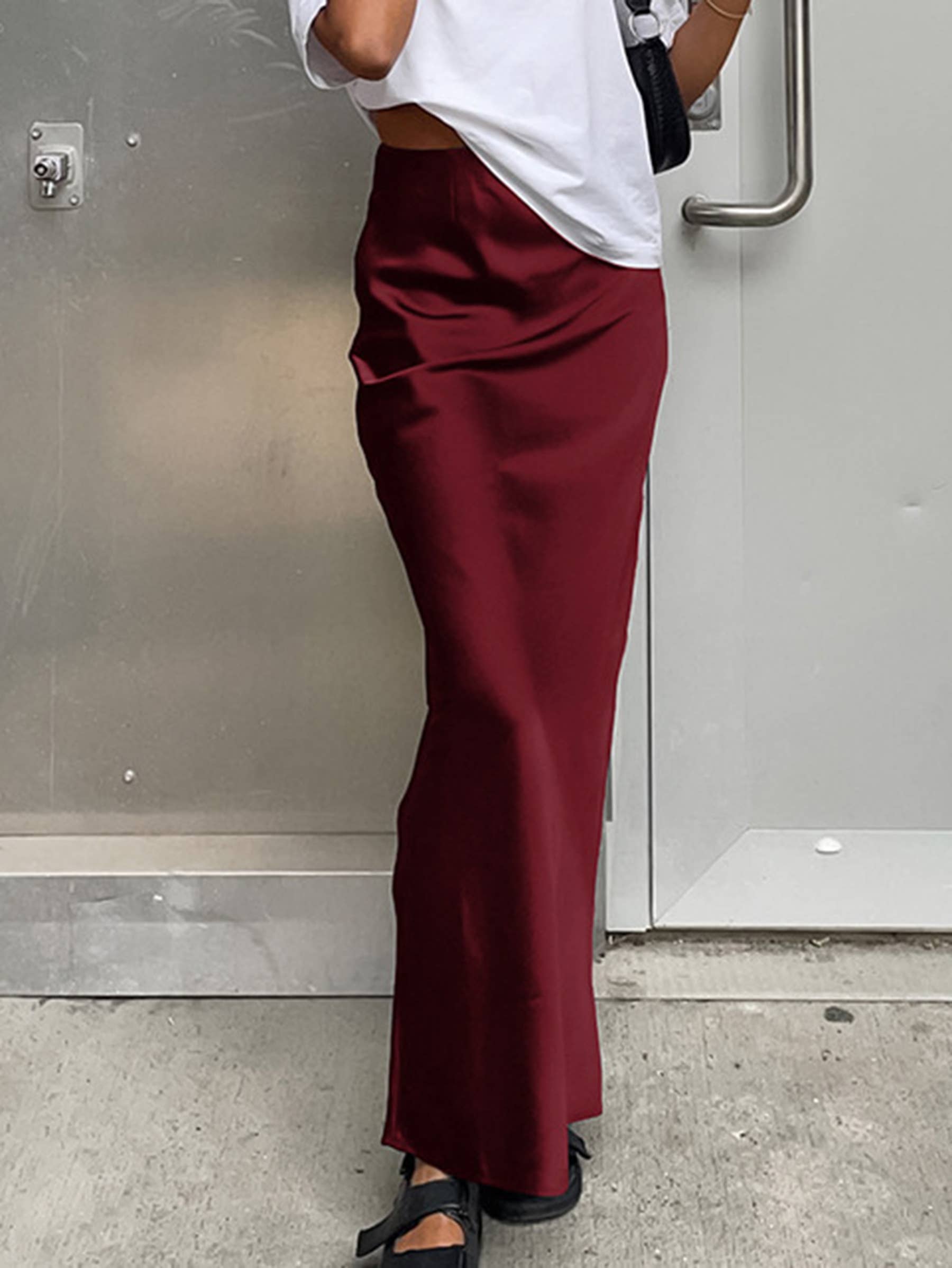 Black satin maxi length fishtail skirt for women, suitable for commuting, by wholesalesir.