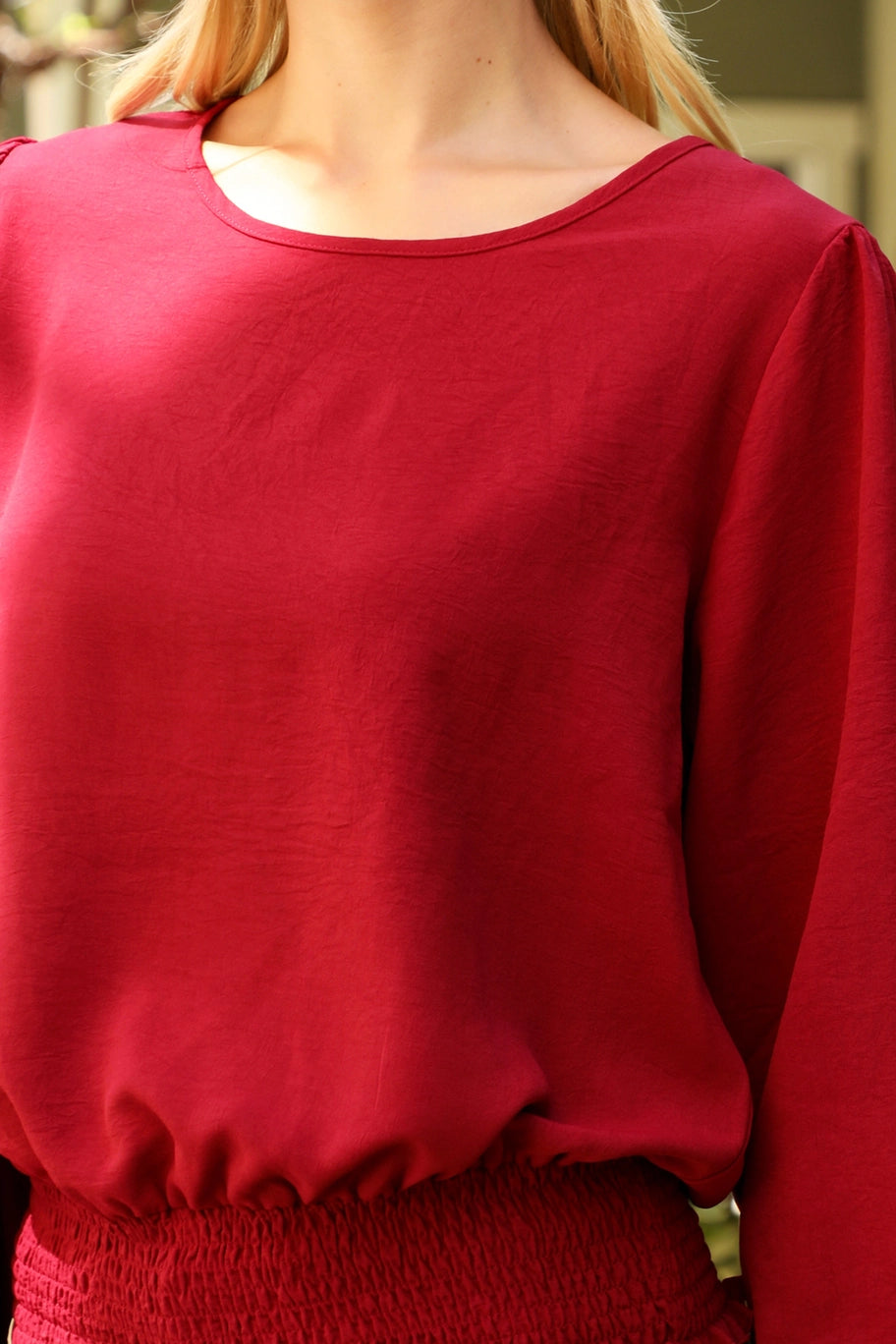 Beige You & Me smocked hem long sleeve woven dressy top with a stylish, solid design and elegant fit.