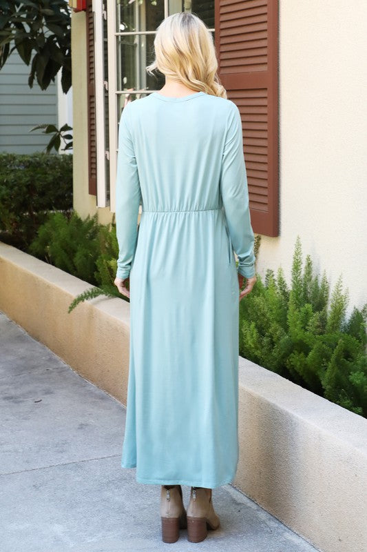 You & Me solid dusty mauve maxi dress with long sleeves and elastic waist, featuring a flowing silhouette and elegant design.