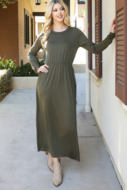 You & Me solid red maxi dress with long sleeves and elastic waist, stylish and comfortable for casual or dressy occasions.