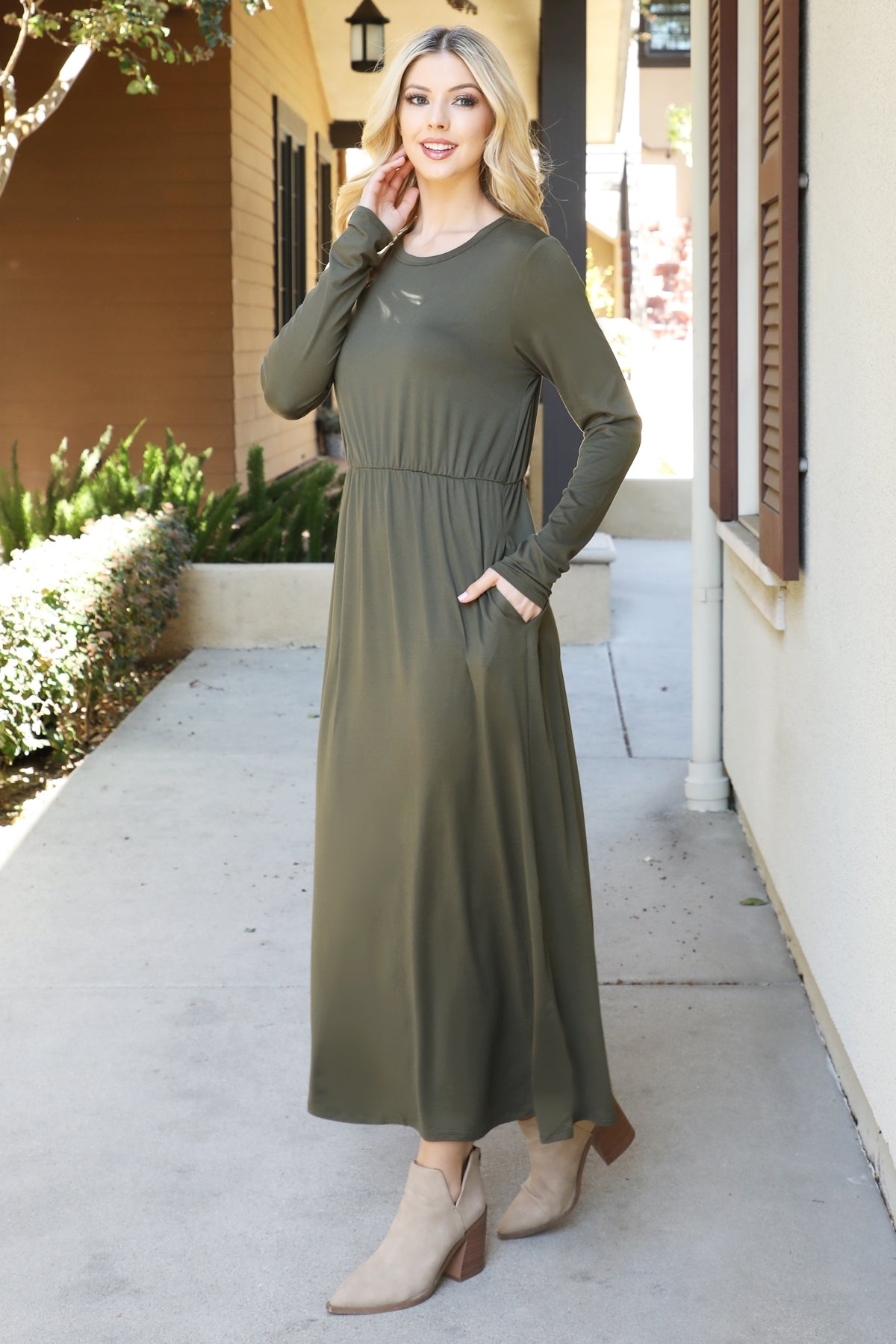You & Me solid terracotta maxi dress with long sleeves and elastic waist, flowing and elegant for casual or special occasions.