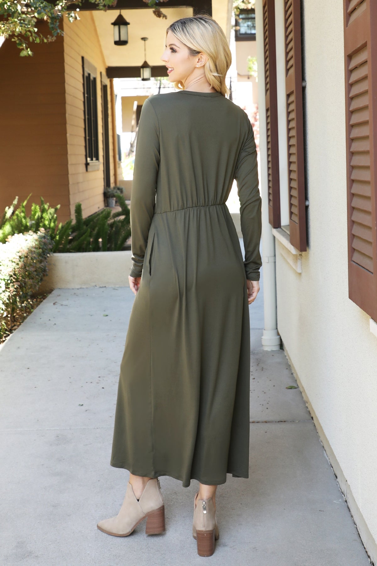 You & Me solid terracotta maxi dress with long sleeves and elastic waist, featuring a flowy, elegant design.