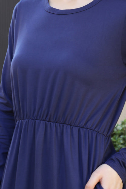 You & Me solid terracotta maxi dress with long sleeves and elastic waist, stylish and comfortable for everyday wear.