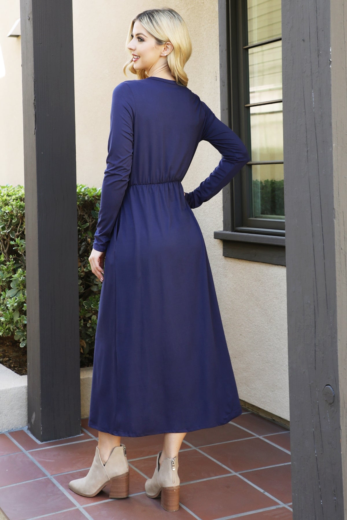 You & Me solid terracotta maxi dress with long sleeves and elastic waist, featuring a flowing silhouette and elegant design.