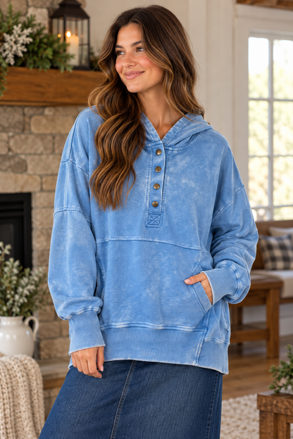 Woman wearing Zenana blue mineral wash snap-front hoodie with a modest denim maxi skirt