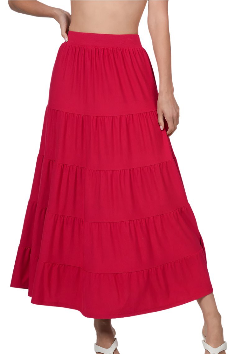 Black Zenana elastic waist tiered ruffle maxi skirt laid flat, showcasing its flowy, layered design and lightweight fabric.