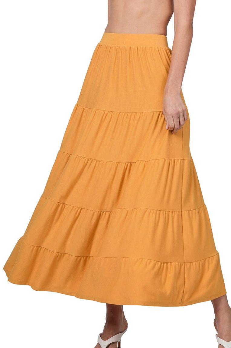 Black Zenana maxi skirt with elastic waist and tiered ruffle design, perfect for a stylish and comfortable look.