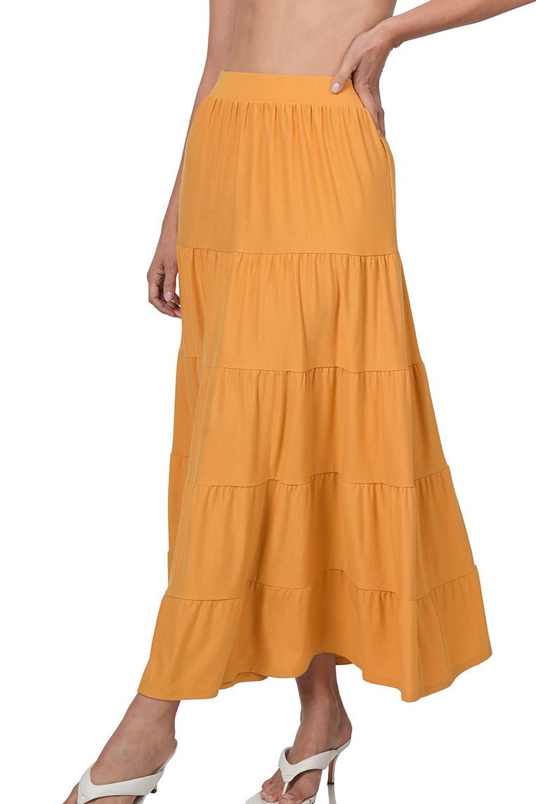 Black Zenana maxi skirt with elastic waist and tiered ruffle design, perfect for a flowy, stylish look.