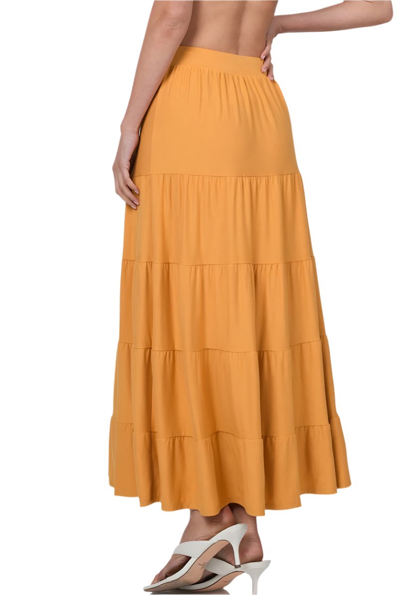Black elastic waist tiered ruffle maxi skirt by Zenana, showcasing a flowy, layered design perfect for casual or dressy looks.