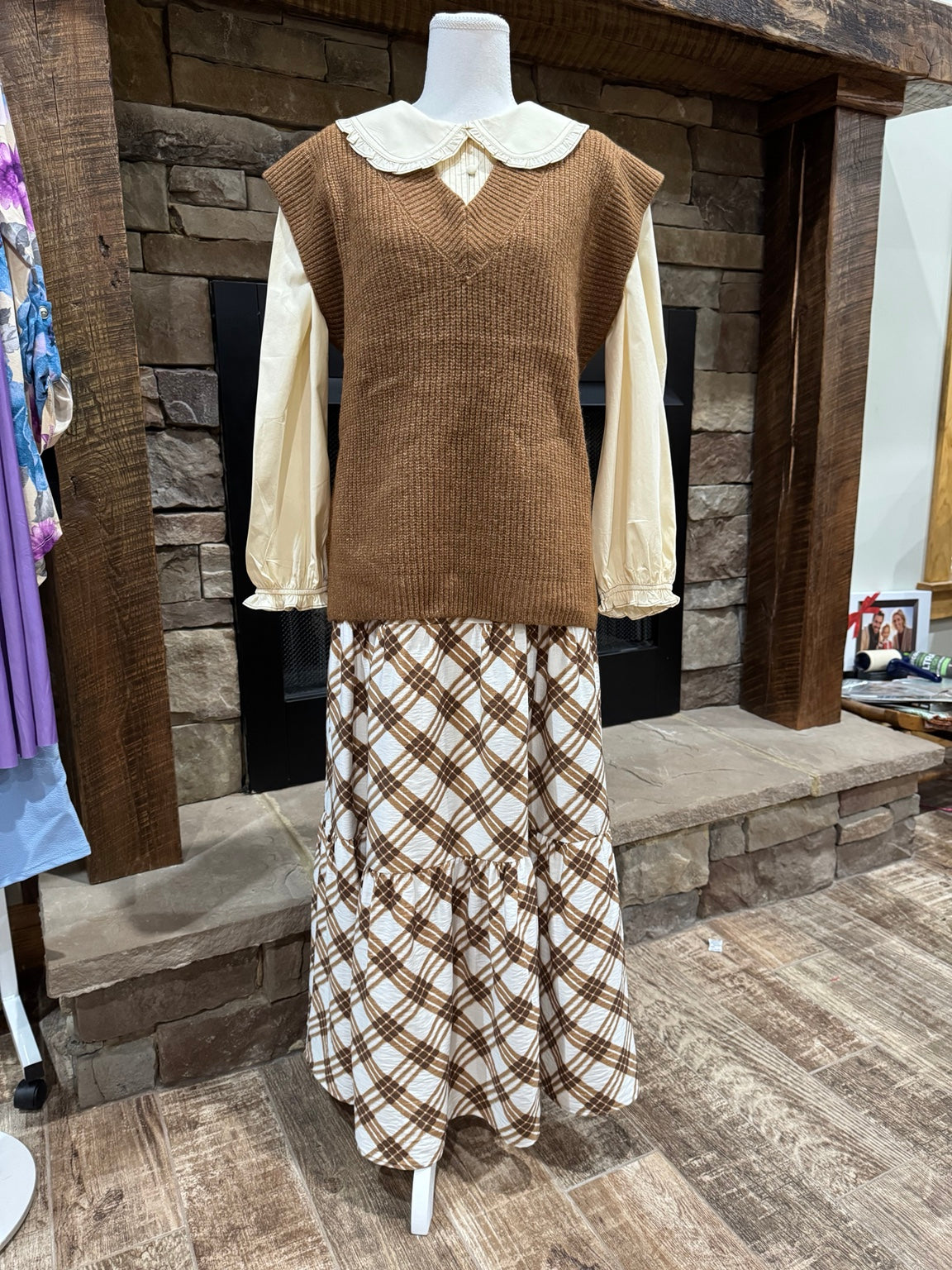 Zenana heathered brown V-neck sweater vest styled over a cream collared blouse