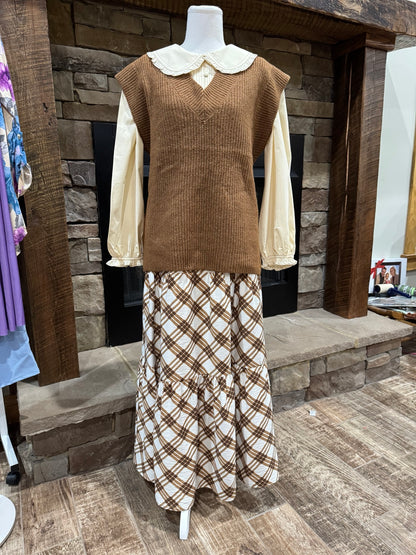 Zenana heathered brown V-neck sweater vest styled over a cream collared blouse