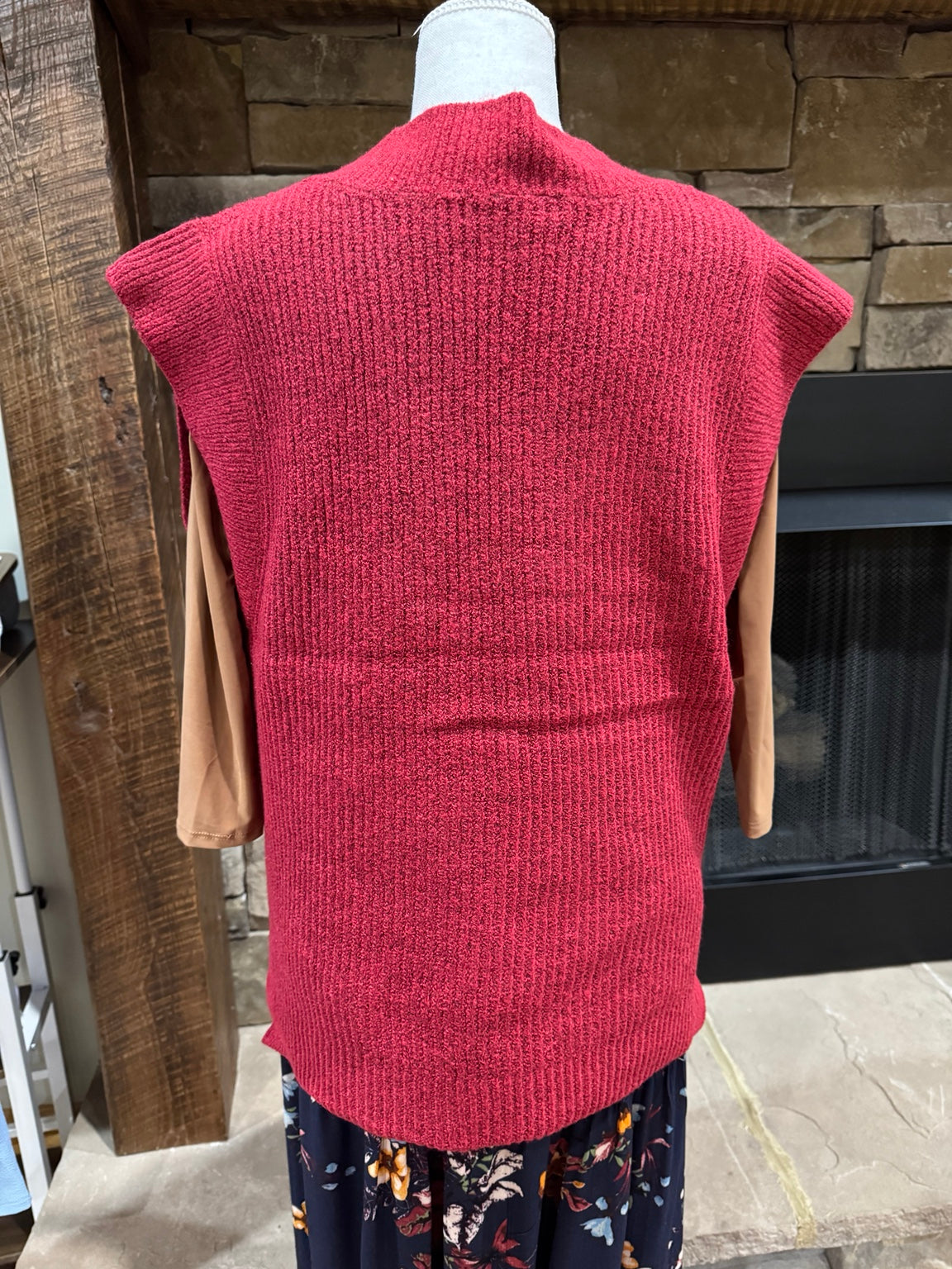 Back of Zenana heathered red sweater vest showing longer ribbed hem
