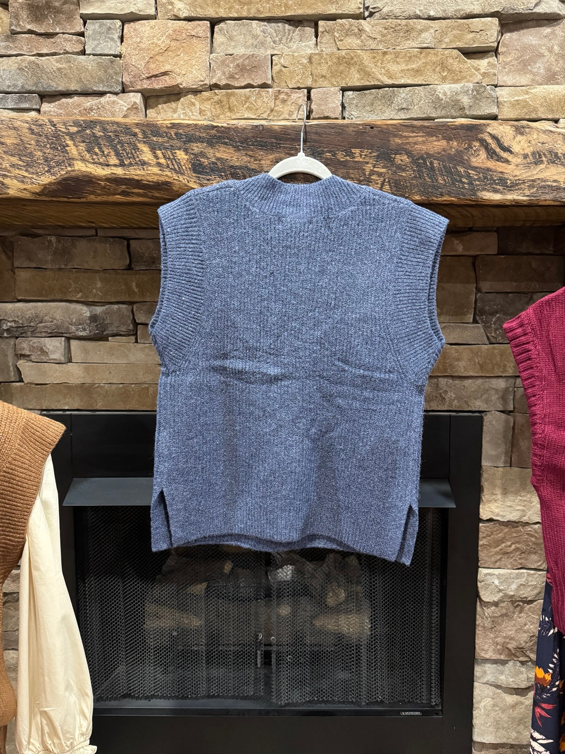 Back of Zenana heathered navy sweater vest showing high-low hem and side slits
