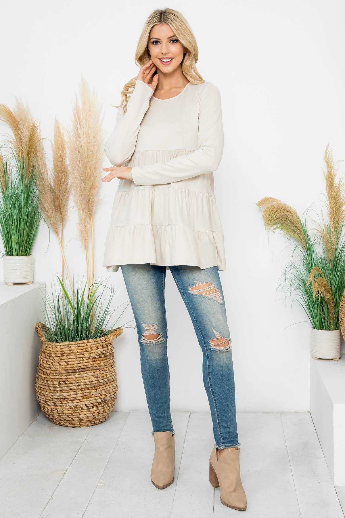 Cream-colored solid long sleeve tiered top by Perfect Peach, featuring a relaxed fit and layered design.