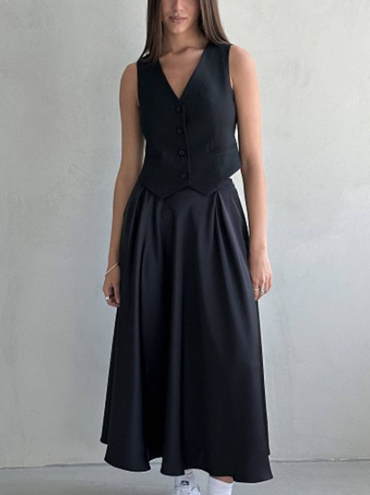 Black high-waisted long dressy skirt from wholesalesir, elegant and stylish for formal occasions.